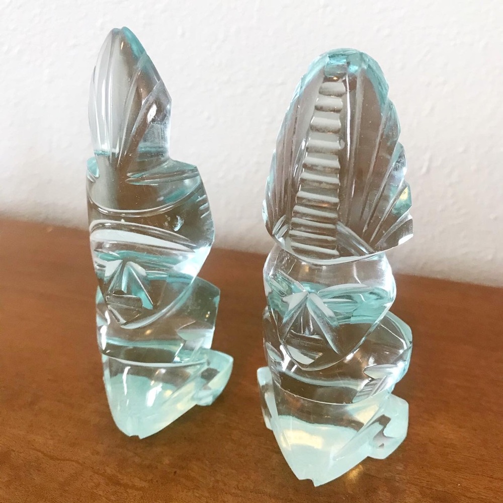 Tribal carved glass bookends